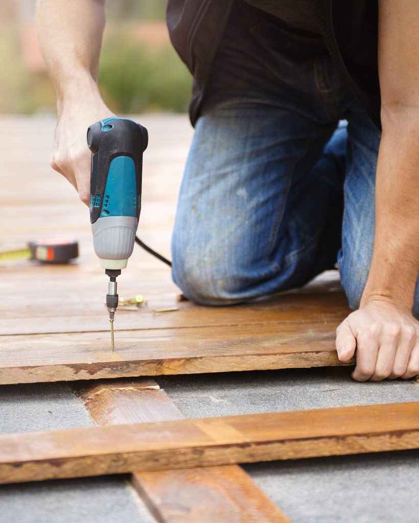 handyman-installing-wooden-flooring-2.jpg